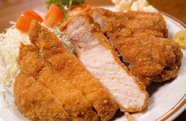 Crispy chicken bread rolls as golden and oozy snacks Crispy chicken bread rolls