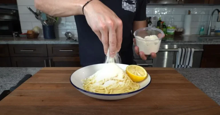 Chef cuts a lemon in half for his 10-minute pasta dish