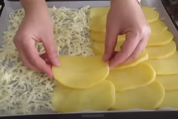 For a delicious meal suggestion, bake layers of cheese and potatoes with meat on a cookie sheet